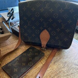 Authentic Louis Vuitton crossbody bag. Free authentic LV matching wallet.